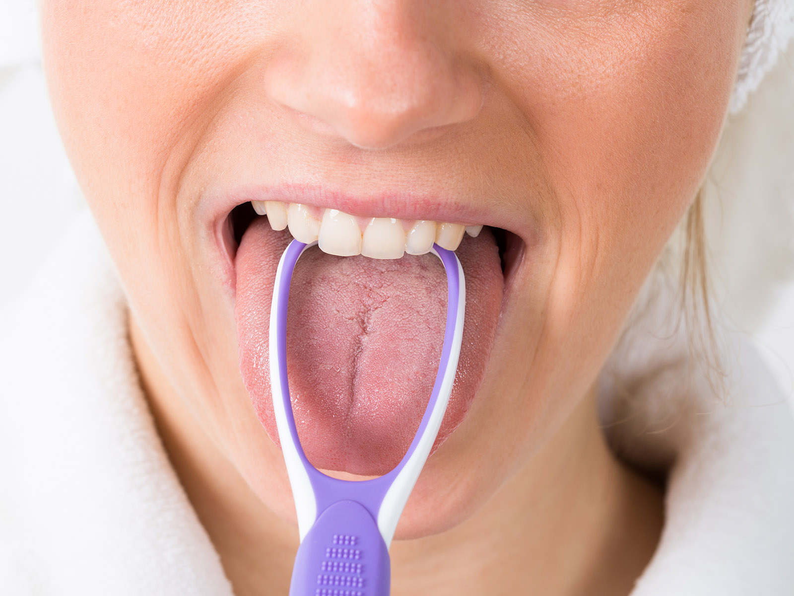 Do You Use A Tongue Scraper Before or After Brushing?